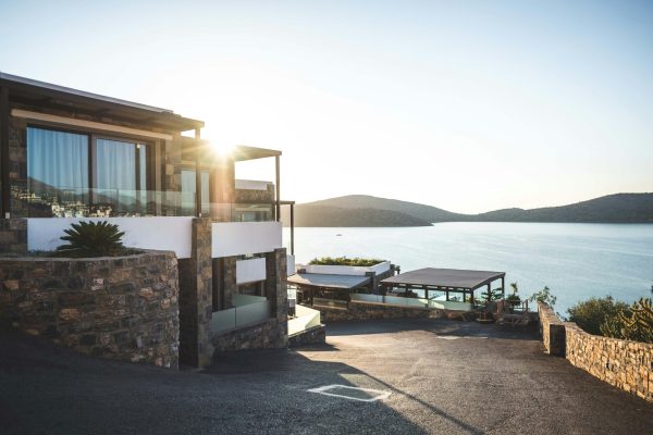 Elegant modern house by the lake with stunning sunrise view. Ideal real estate.